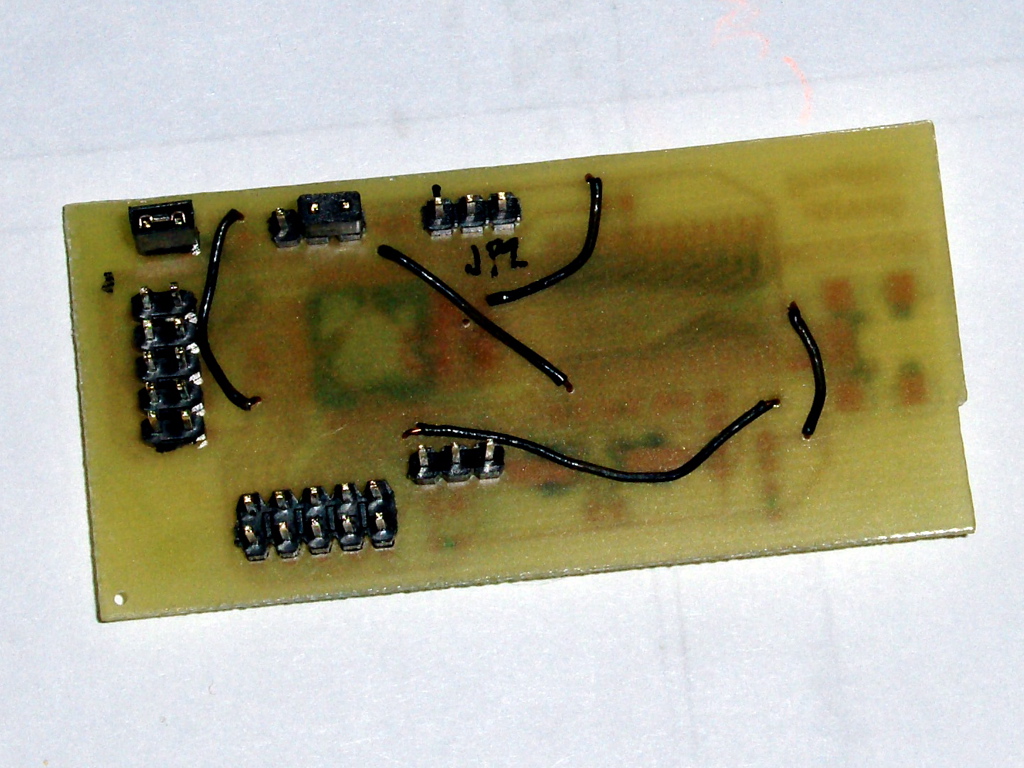 The connector and air-wire side of the UsbProg-SHARP board